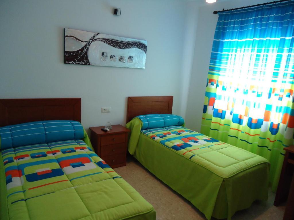 Hostal Los Claveles Баэна Номер фото