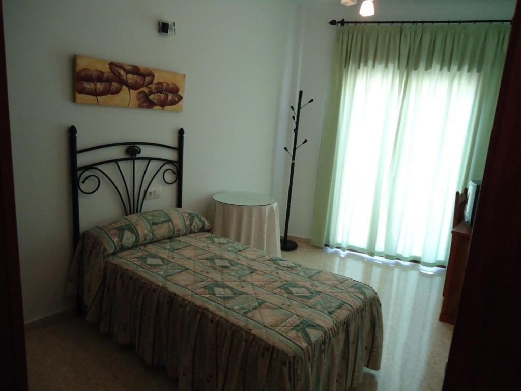 Hostal Los Claveles Баэна Номер фото